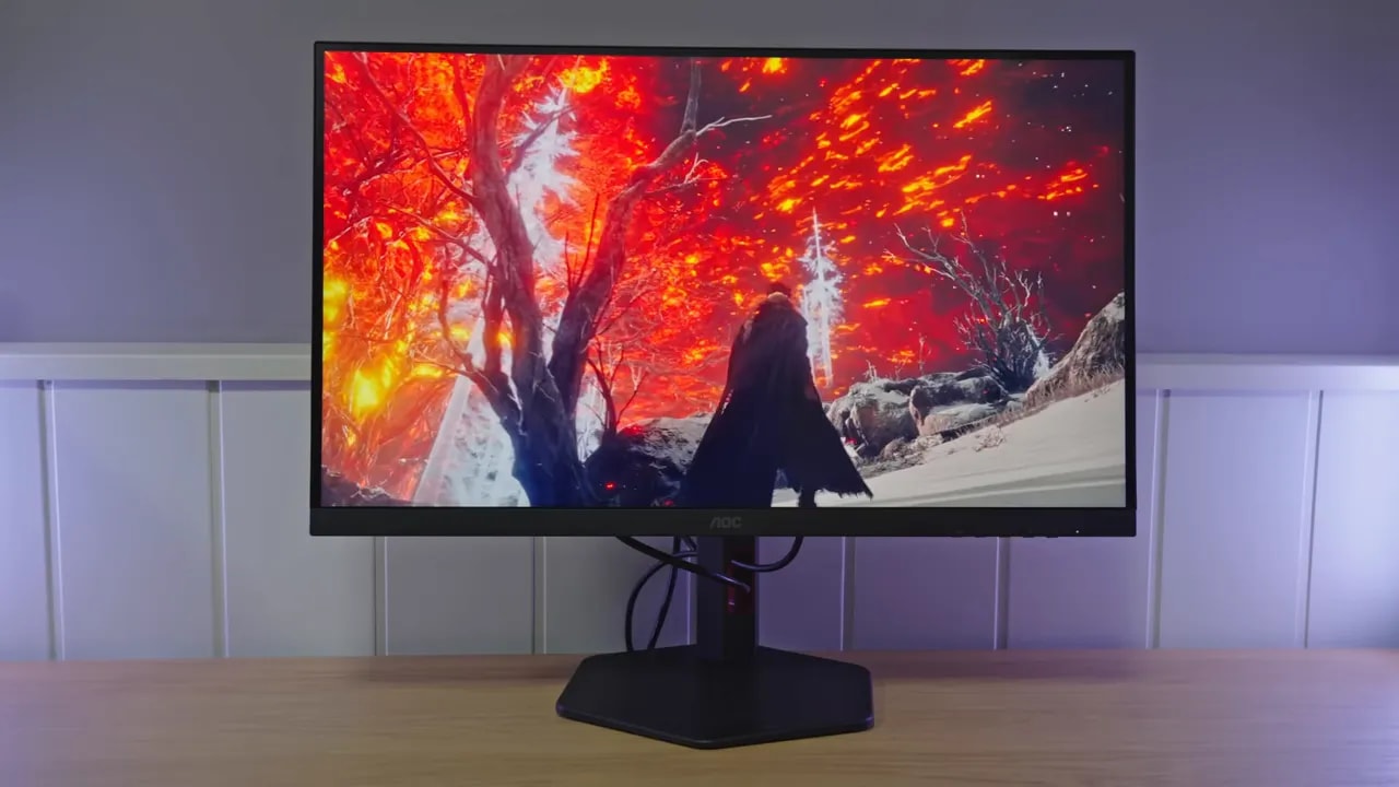 Pantalla AOC U27G4R mostrando una escena gaming con alto contraste y modo Dual Mode
