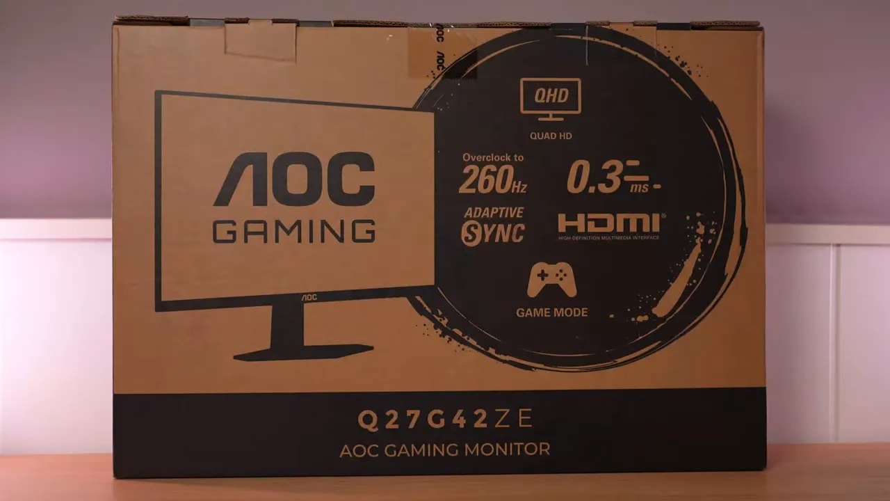 Cable de conexión del AOC Q27G4ZE mostrado durante el desempaquetado