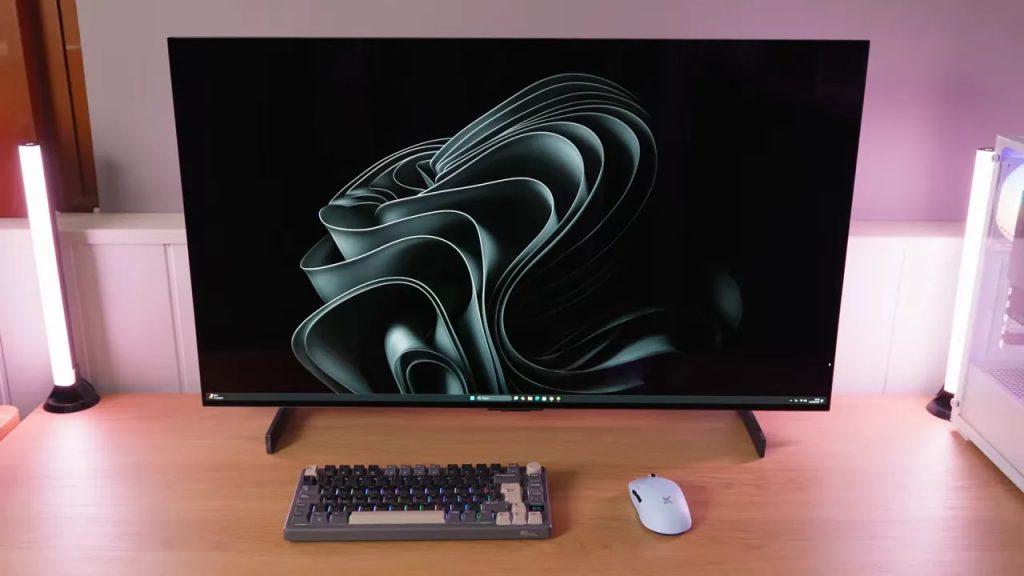 42-inch LG C5 OLED 42 set up as a desktop monitor with a keyboard and mouse