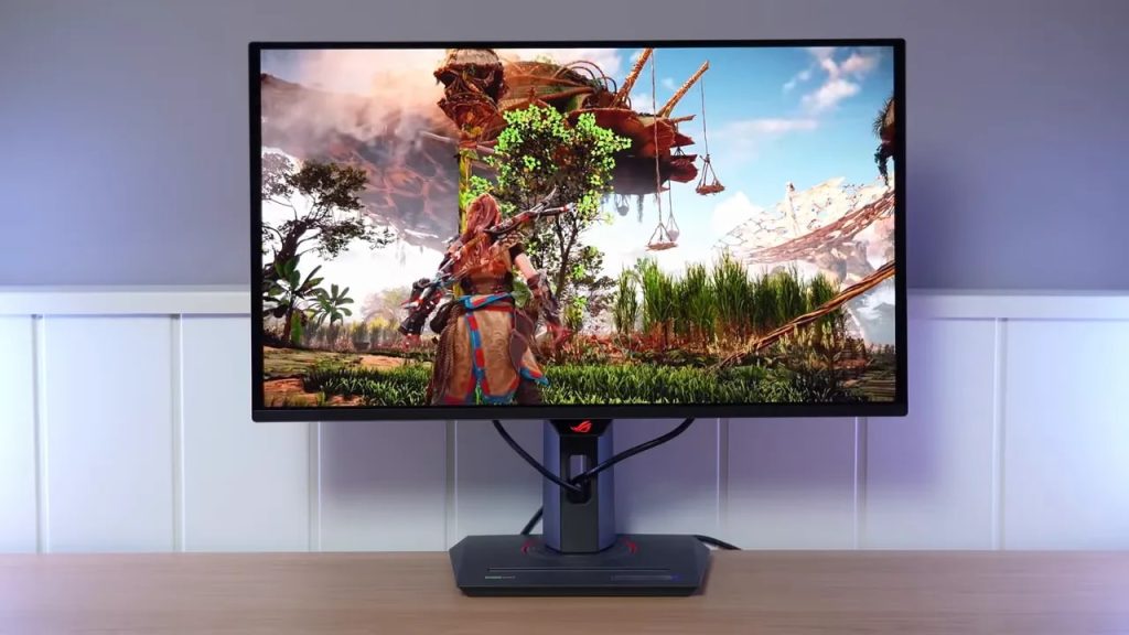 Monitor Asus ROG XG27UCDMG en escritorio mostrando un juego 4K