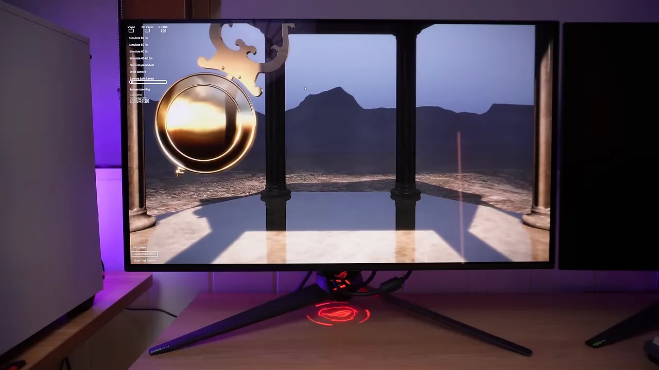 Monitor OLED mostrando escena de prueba con elementos de configuración/indicador de VRR en pantalla