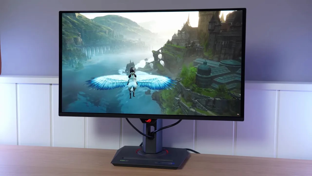 Monitor gaming QD-OLED en escritorio mostrando una escena con mucho detalle para comparación de Asus vs MSI