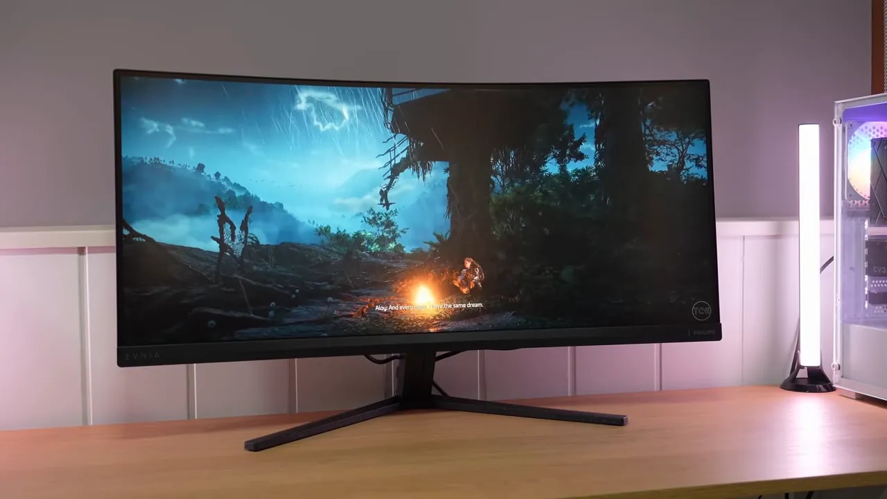 Philips Evnia 34M2C3500L mostrando una escena con luces y acción en un ultrawide curvo de 34 pulgadas