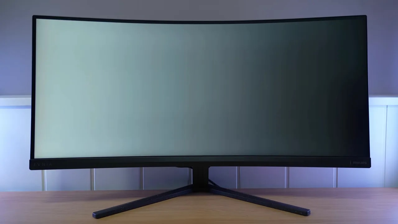 Vista frontal del Philips Evnia 34M2C3500L con fondo oscuro para observar flickering